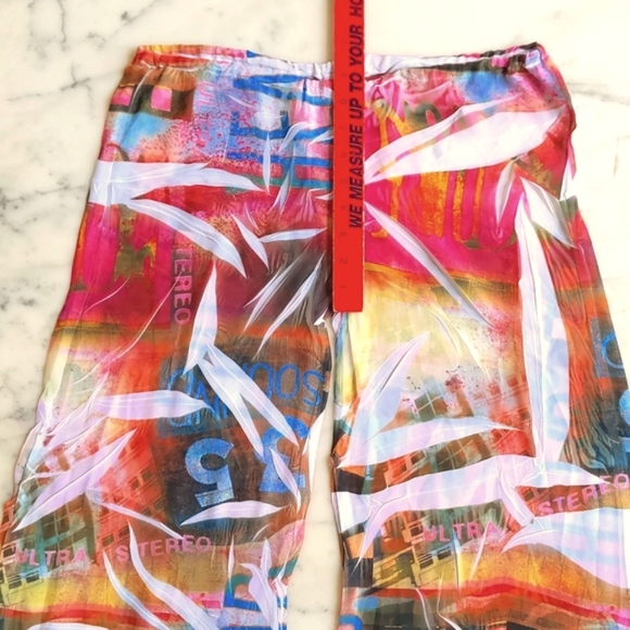 NWOT. Carolina Multi Color Pattern and Words Sheer Wide Leg Pant. - Picture 3 of 6